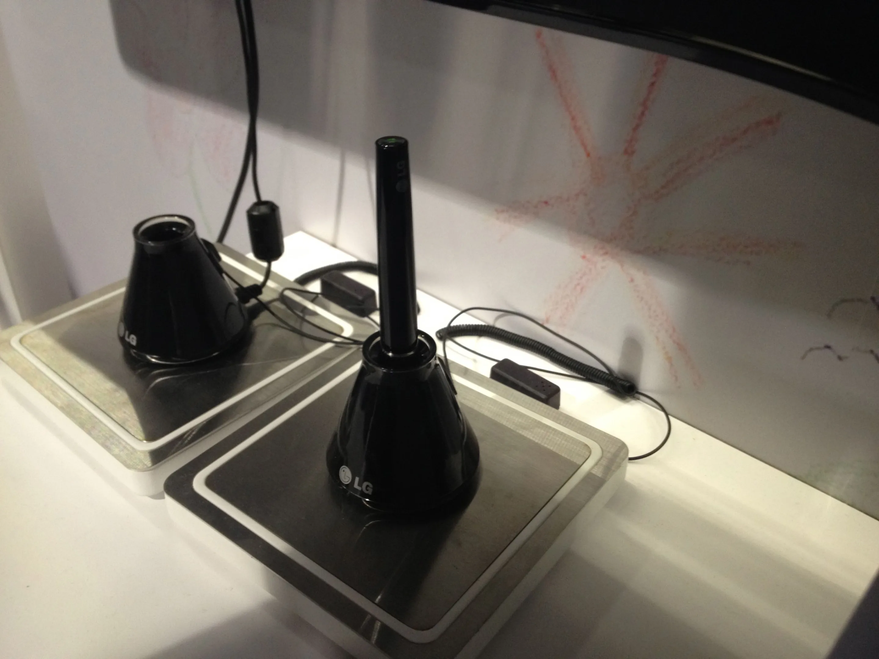 The wireless pen in its charging port