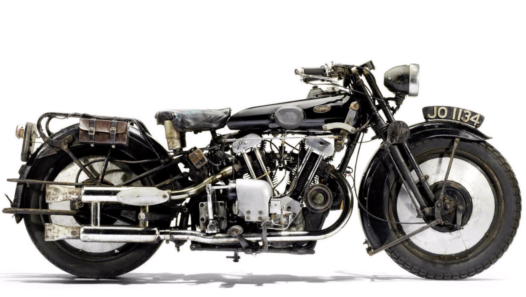 The history of this wonderfully patinated Black Alpine is known from new, including starring with such luminaries as Wallace & Grommit on Channel 4's Big Breakfast in 1996. A matching numbers machine, it comes with a large history file including photographs, a Brough Superior club copy of the original works record card, contemporary magazine reports of the new Black Alpine, a separate notebook recording work on the machine over many years, a 1937 letter from George Brough to the then owner, an 2012 article written for the Brough Superior Club newsletter, a 1996 roadtest of the machine by Motorcycle Sport and Leisure, a photocopy of a two page chapter about the machine from Titch Allen's Brough book Legends in their Lifetime, two continuation logbooks, ad infinitum. Estimated to fetch £70,000 - 100,000 ($100,000 - 150,000), full details at the official auction Page