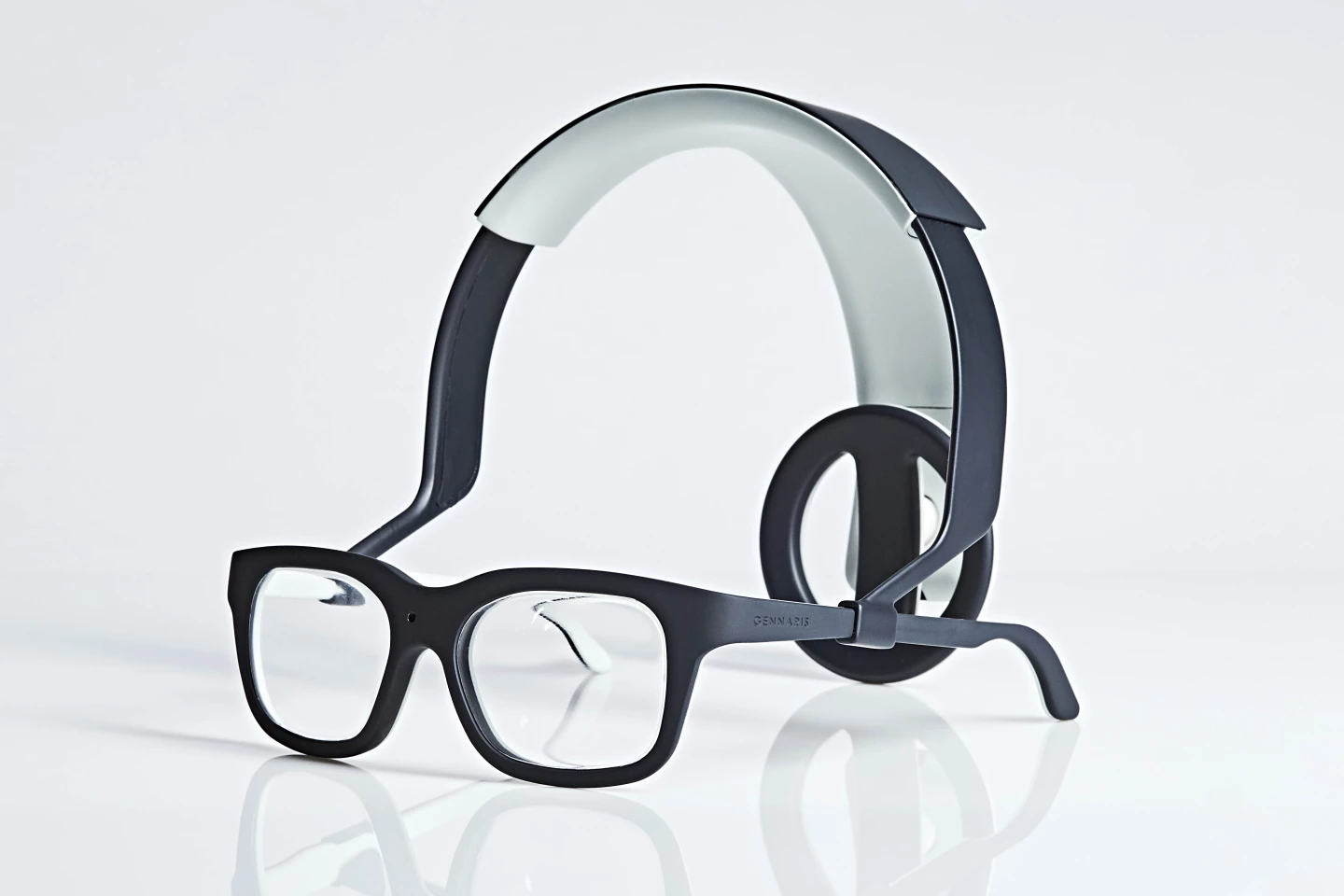 The Gennaris bionic vision system consists of custom headgear with a built-in camera, a wireless transmitter, a vision processor and software, along with a set of square tiles fitted with hair-thin electrodes that are implanted in the brain