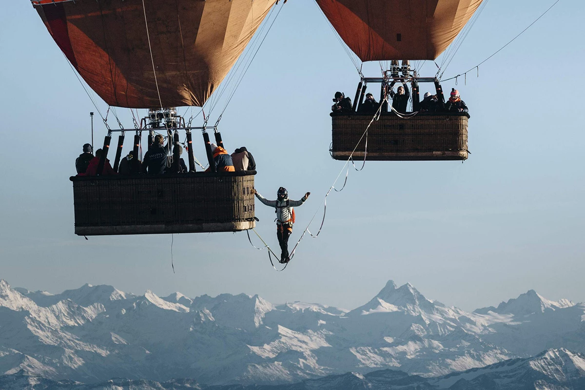 Roux traversed a 62-ft-long line less than an inch wide between the two hot air balloons
