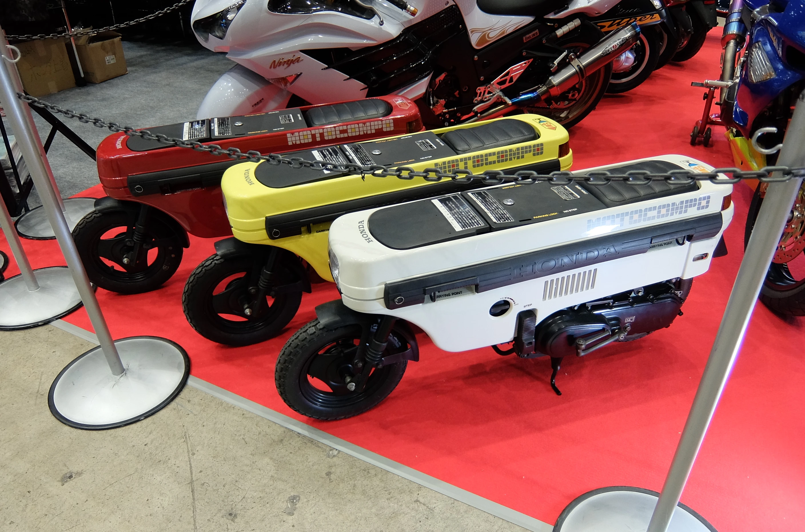 Not on the Honda stand but in the show were these machines. These are Honda Motocompo`s and were folding scooters sold from 1981-1983 (Photo: Stephen Clemenger/Gizmag.com)