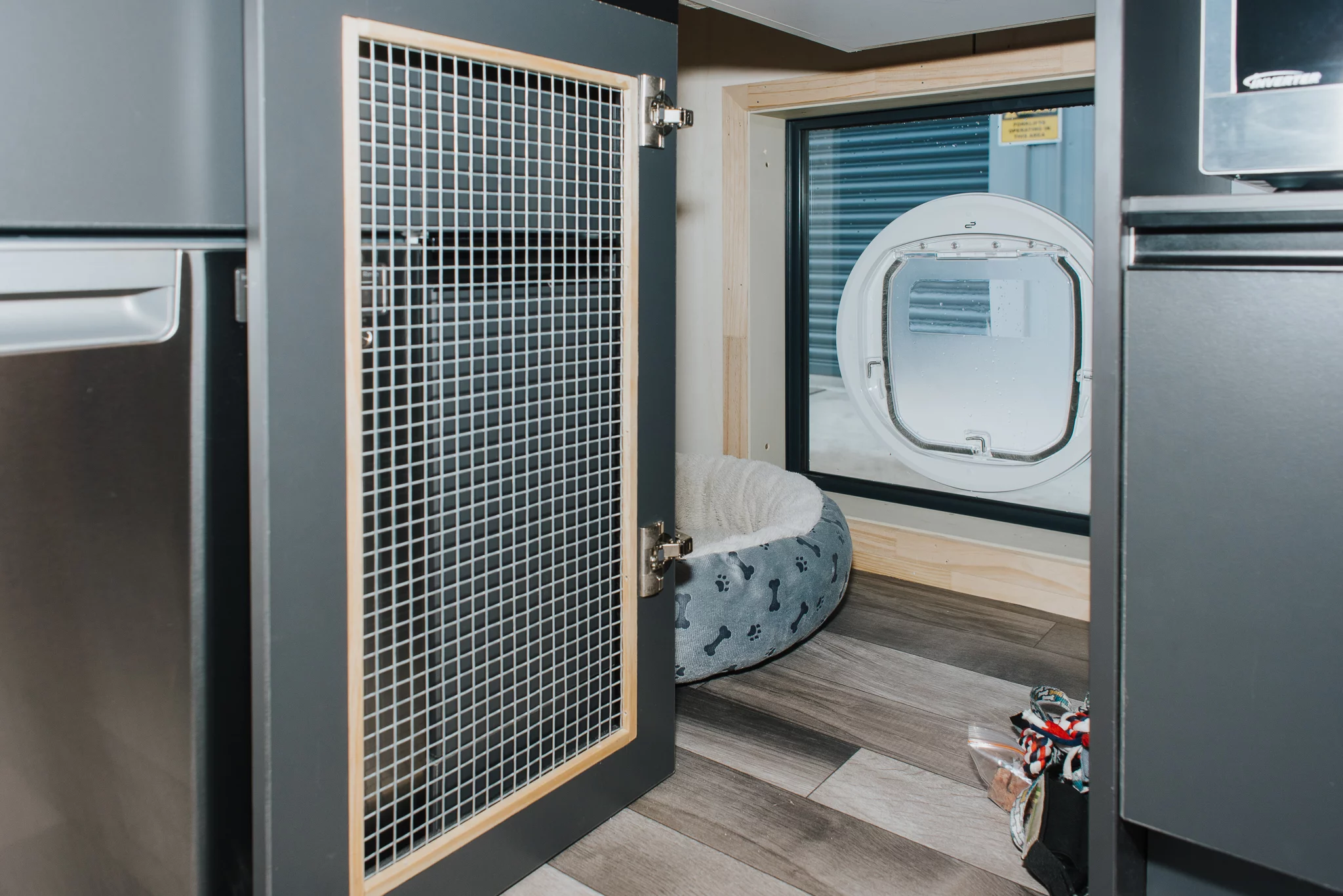 The Autumn's kitchen includes a small pet door for the owner's dog