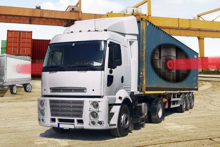 Artist rendering showing how the system detects nuclear materials hidden in a steel cargo container by using a pencil X-ray beam, emerging from the right, that penetrates through shielding and reveals an image of a hidden uranium object on a detector, at left