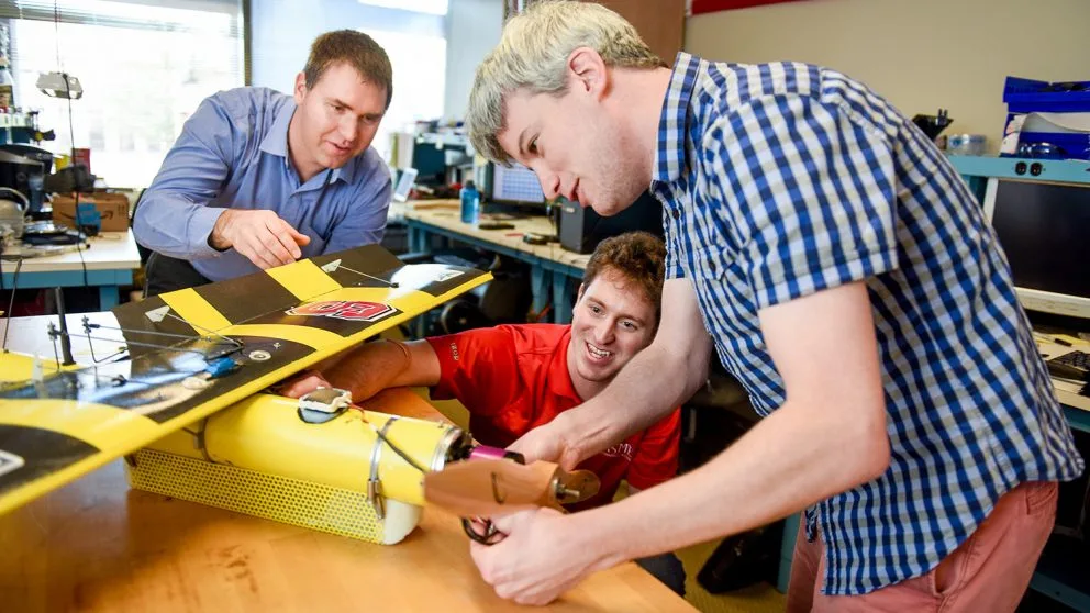 North Carolina State University engineers (from left) Matthew Bryant, Warren Weisler and William Stewart, with a prototype of the EagleRay