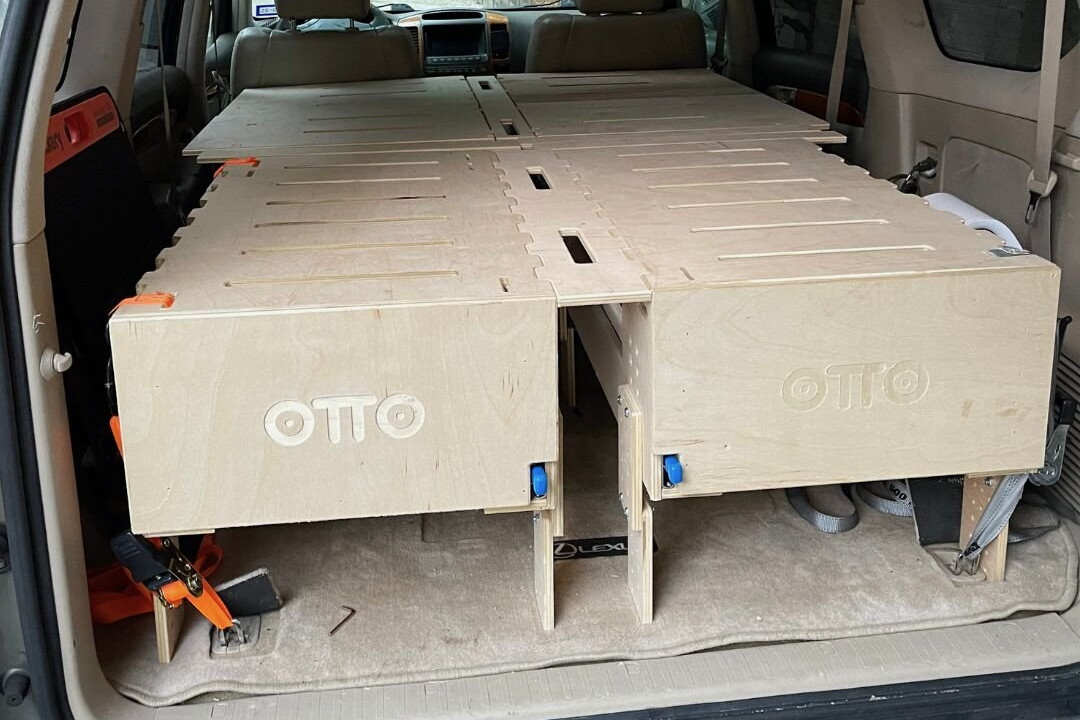 The Otto Nest is secured to the inside of the vehicle via ratchet straps