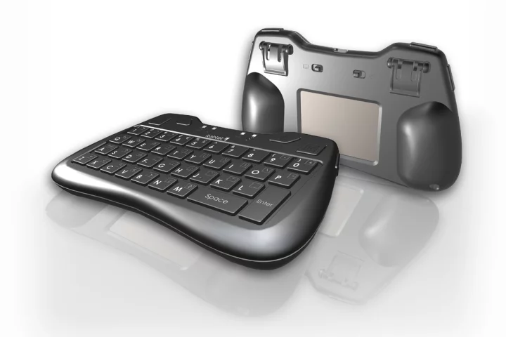 The itablet Thumb Keyboard with front facing QWERTY keyboard and rear-facing touchpad