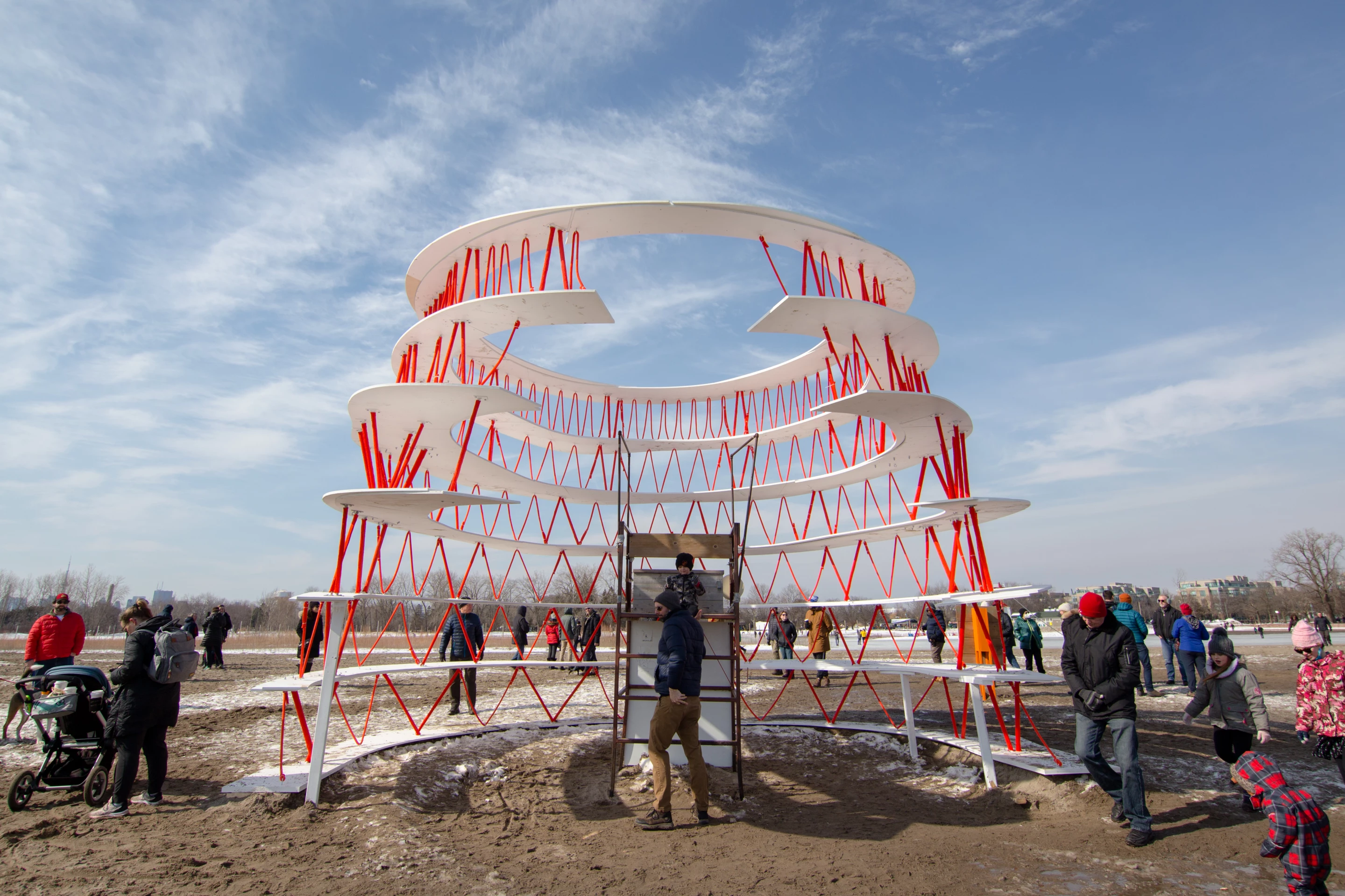 One Canada was created by University of Guelph, School of Environmental Design and Rural Development's Alex Feenstra, Megan Haralovich, Zhengyang Hua, Noah Tran, Haley White and Connor Winrow. They were led by Assistant Professor Afshin Ashari. The design draws inspiration from Canada's indigenous people and its overall form aims to symbolize bridging the gap between the Indigenous and non-Indigenous people of Canada