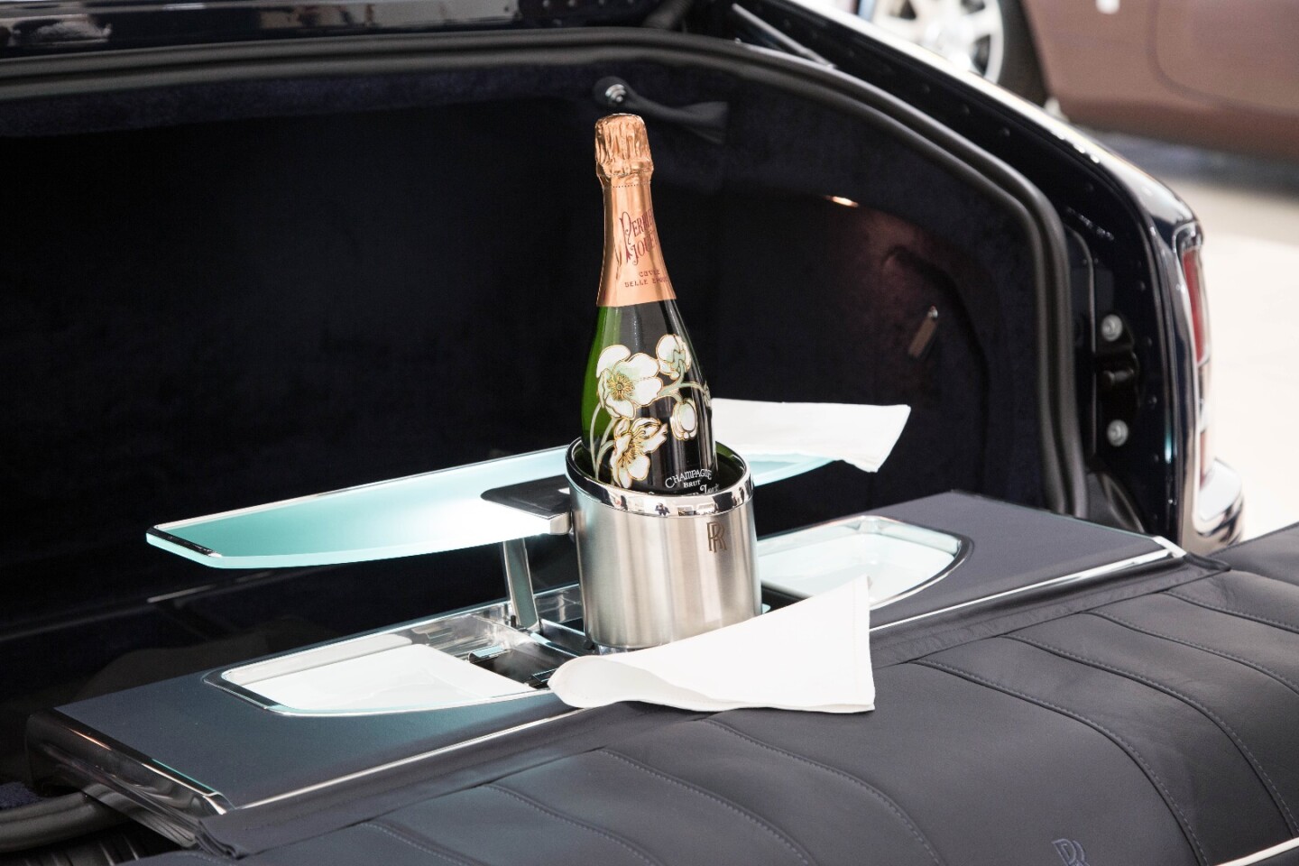 Nothing combines better than champagne and driving in expensive cars
