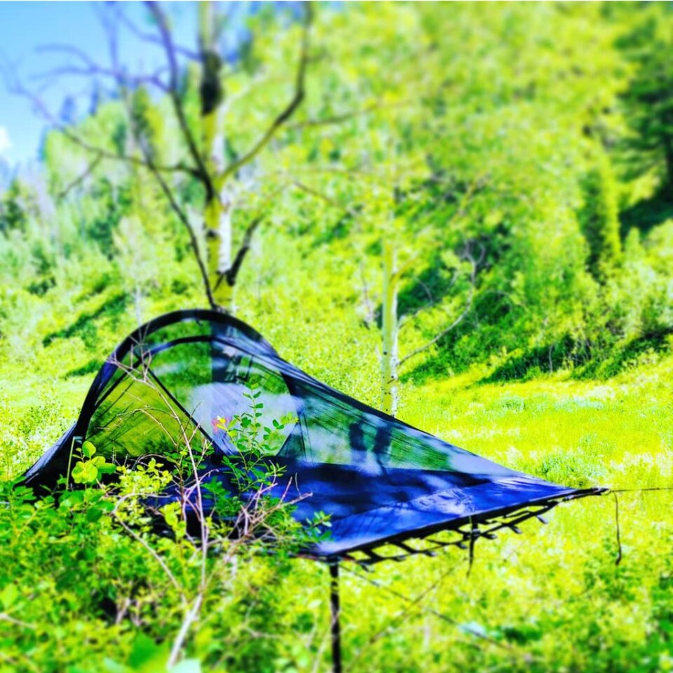The Bivymok suspended tent features a soft polyester mesh to keep the bugs out