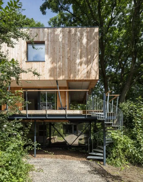 The home is clad with untreated Larch