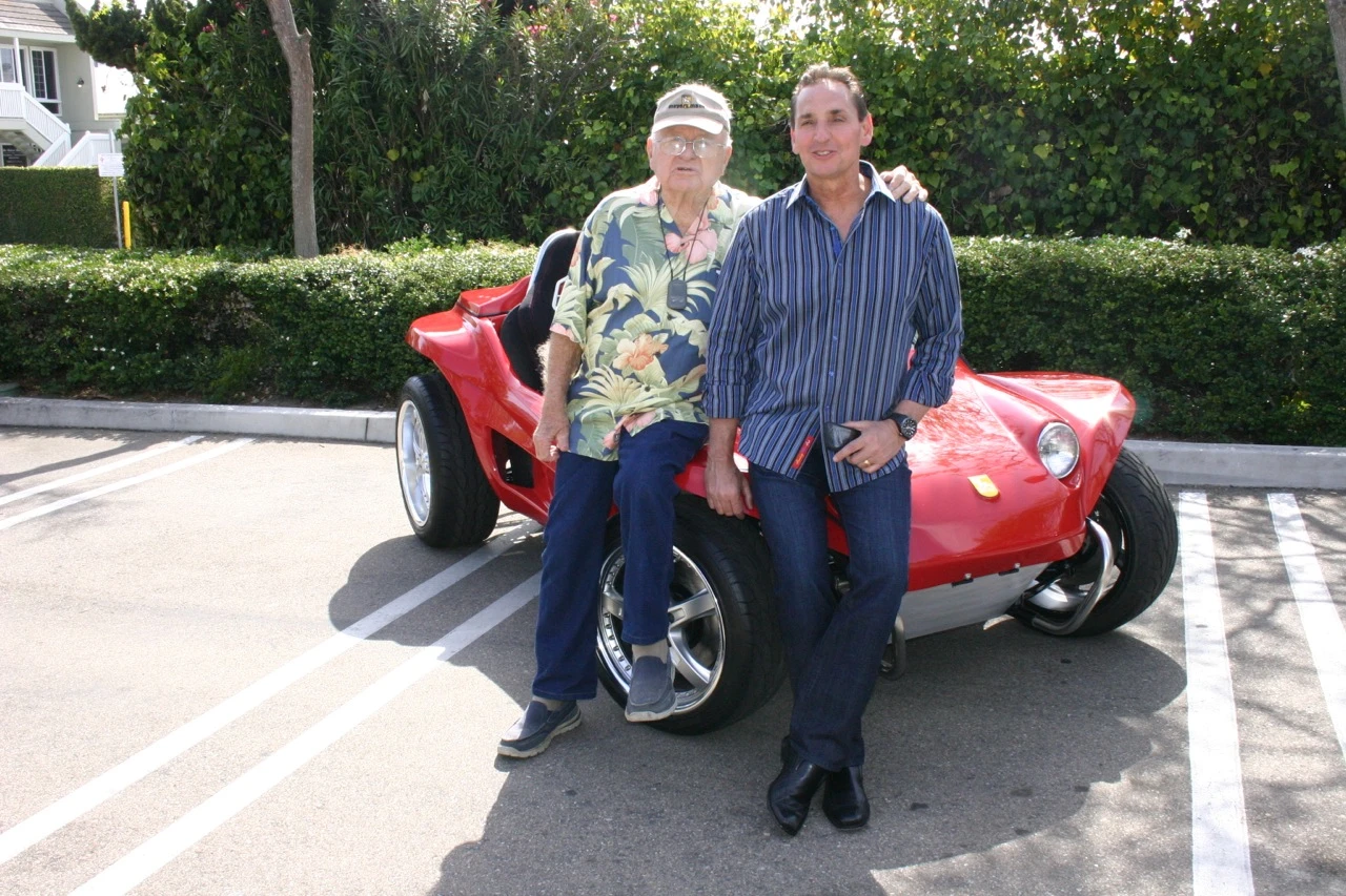 Bruce Meyers and Fred Winters, president of Rev-TEC, pose with the Manx V