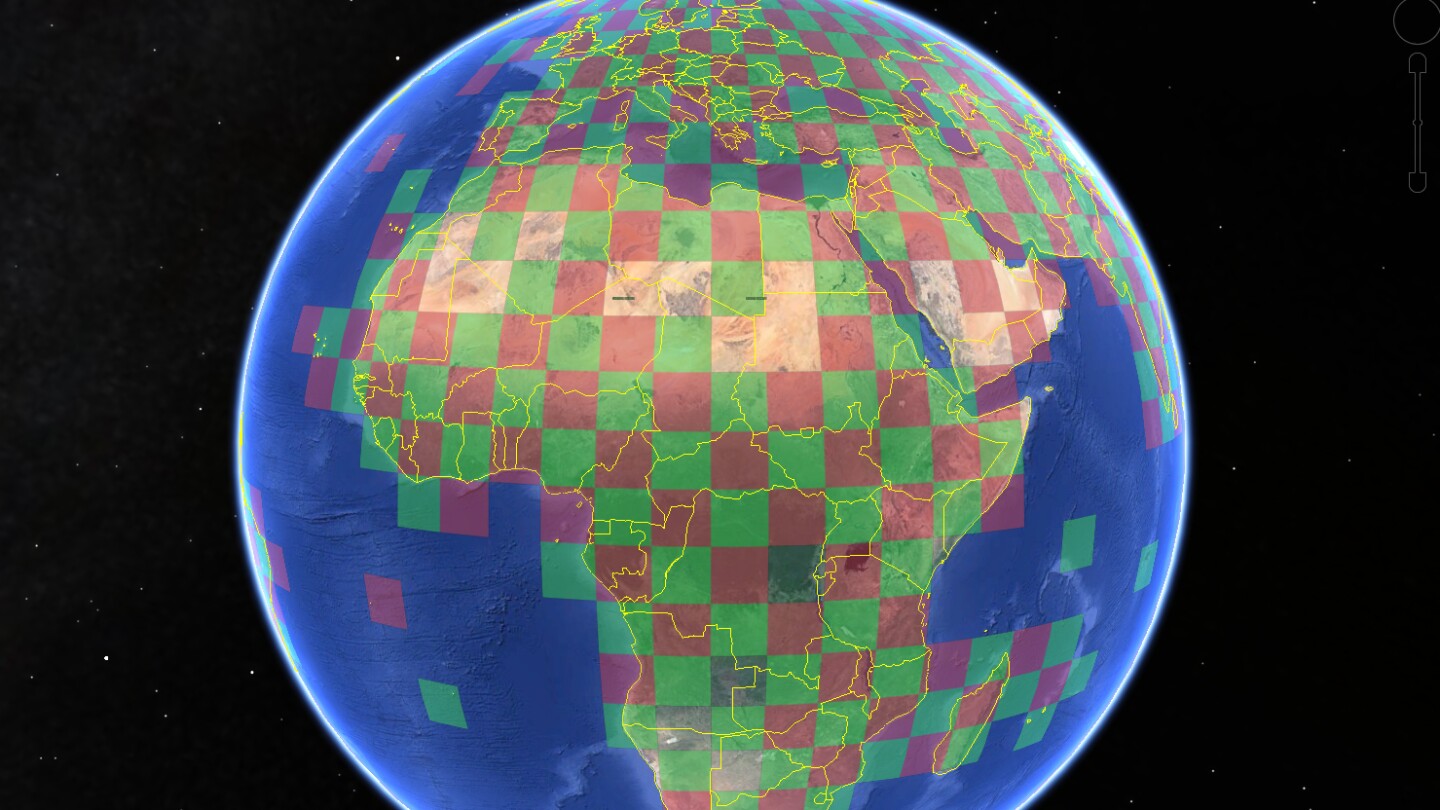 Gaps in the checkerboard indicate remote areas that lack weather stations