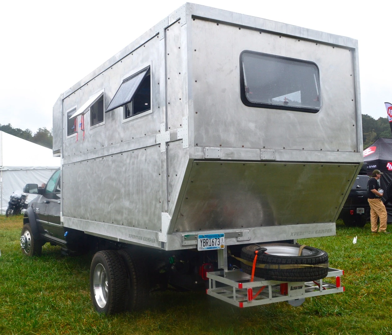 There was no one around this HAF Xpedition Camper when we visited, so we're not sure the details of it specifically, but some of the model specs on HAF's website include 800 watts of solar panels all around the camper roof, wet bath and 13K BTU air conditioner