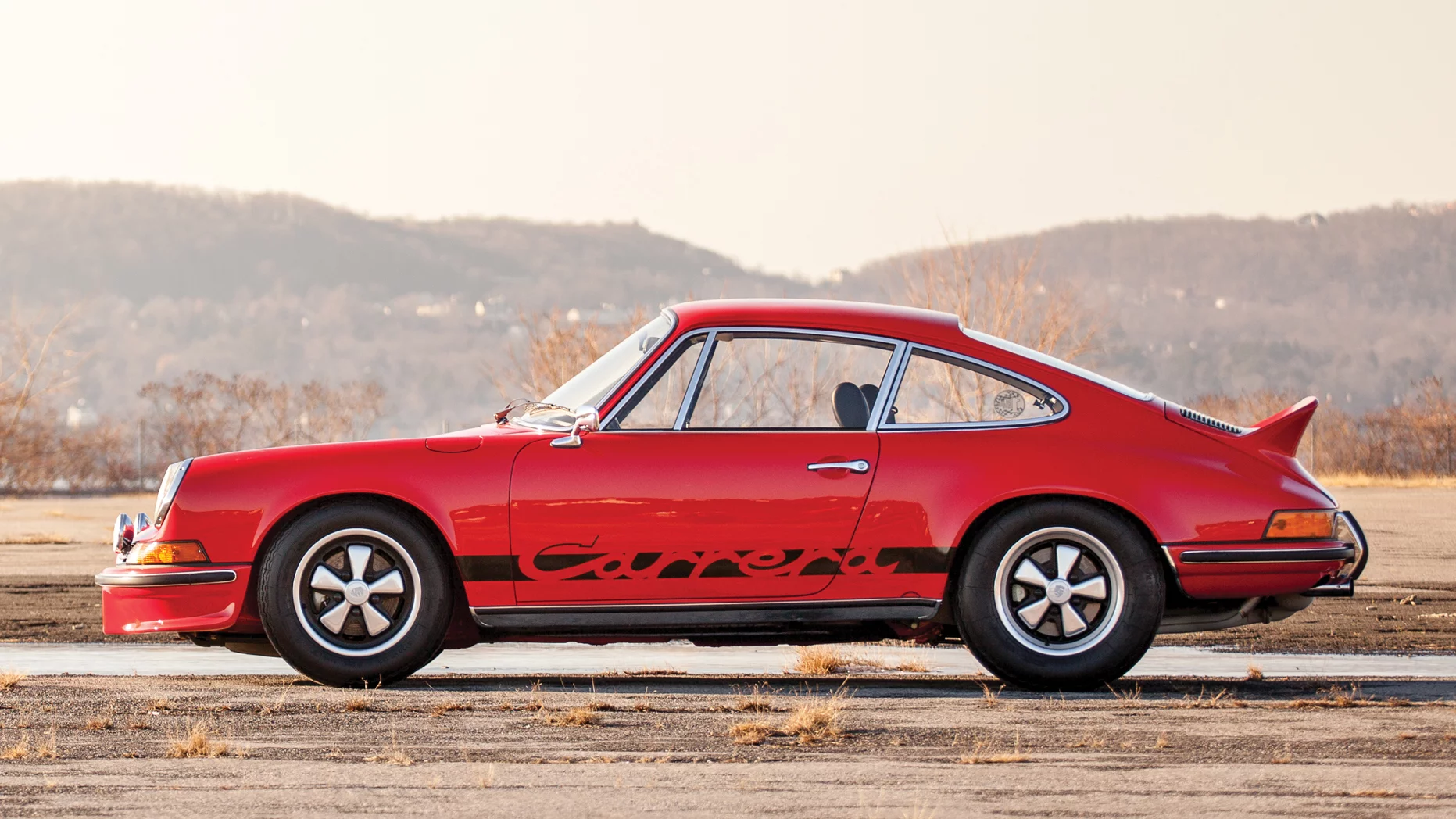 This 1973 Porsche 911 Carrera RS 2.7 Touring was estimated to sell for $775,000 - $975,000 and sold for: $891,000Official Auction Page