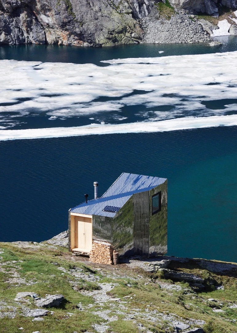 The On Mountain Hut is situated high up in the Swiss Alps, between the Piz Lunghin mountain and the Lunghin Pass at an elevation of 2,485 m (8,152 ft)