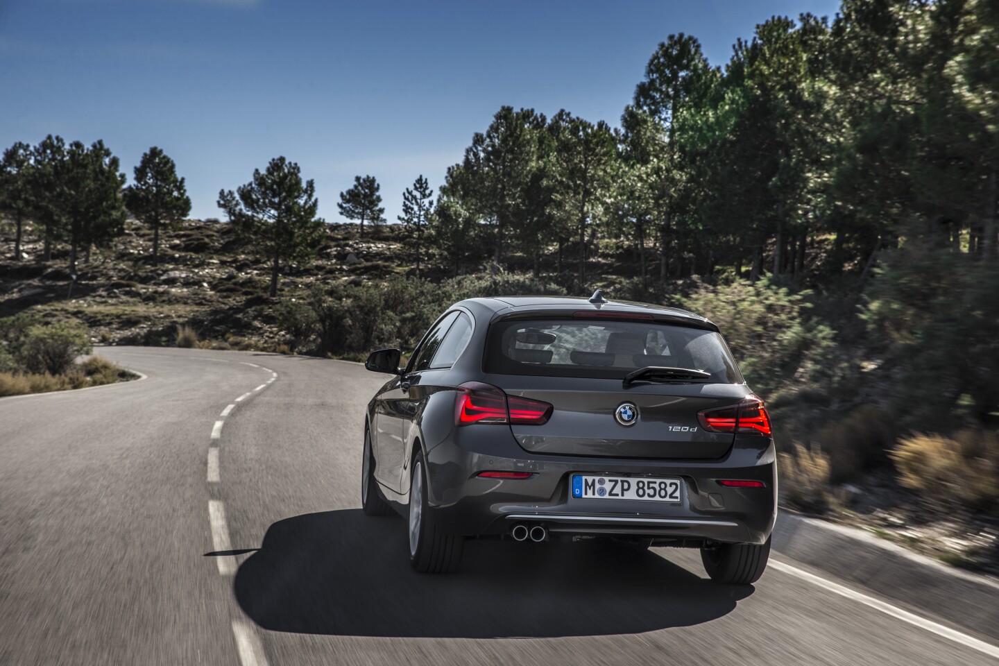 At the rear, broader taillights highlight the car's width