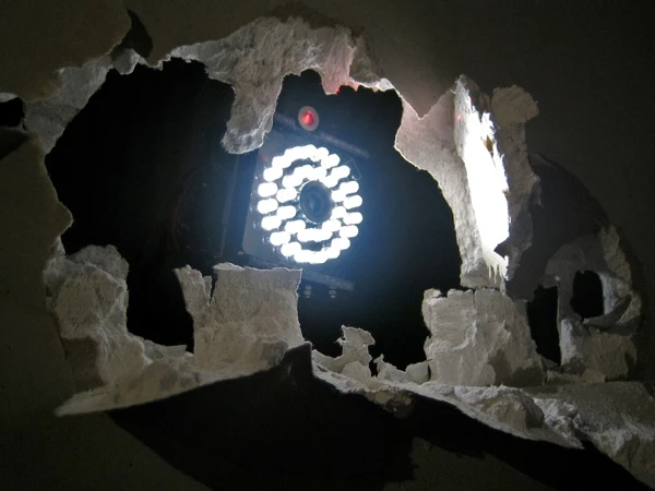 Accomplice is an artwork in which artificially intelligent robots gradually destroy a wall