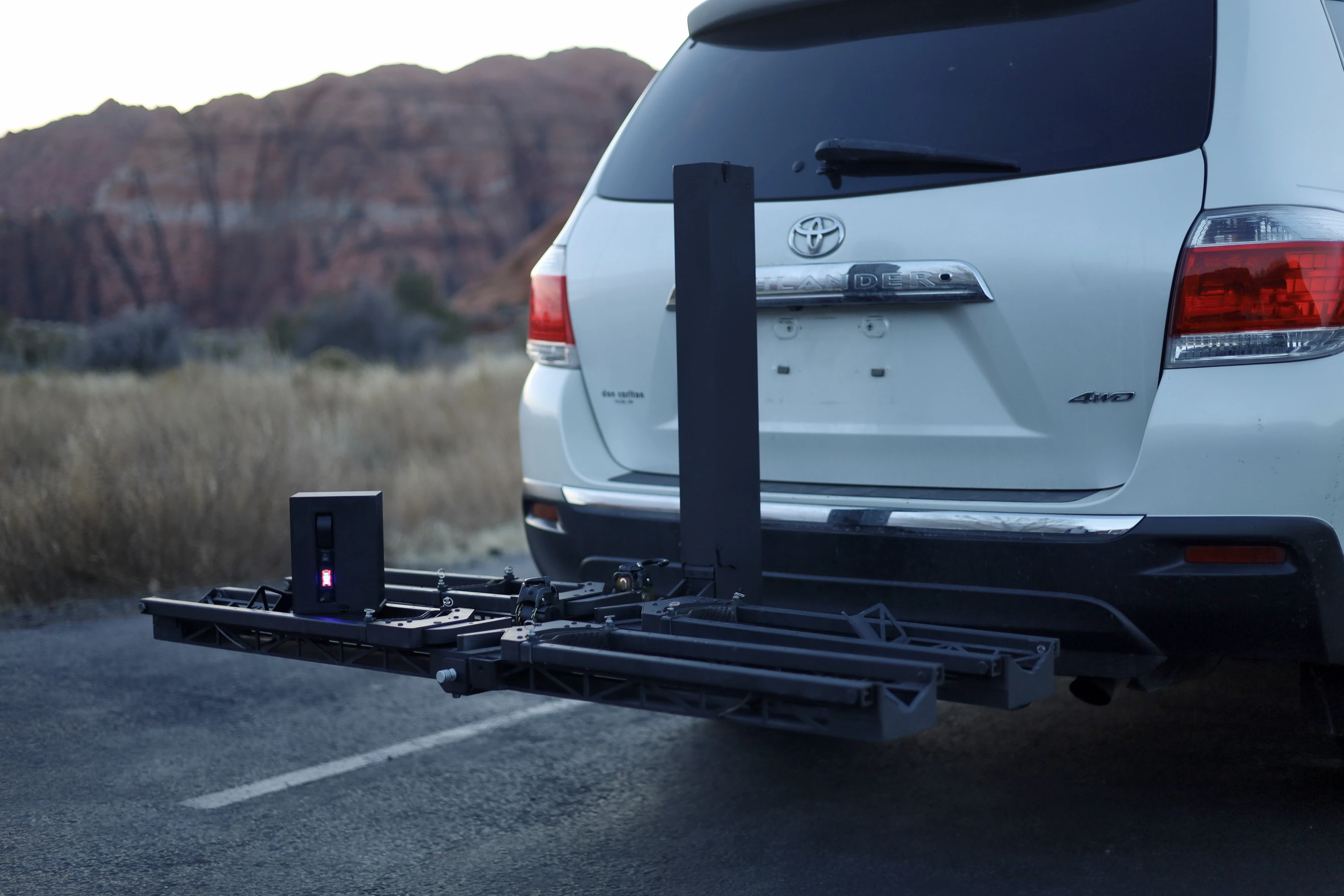 Hefting Load 'n' Lift rack gets low and uses a motor for easier hefting of bikes
