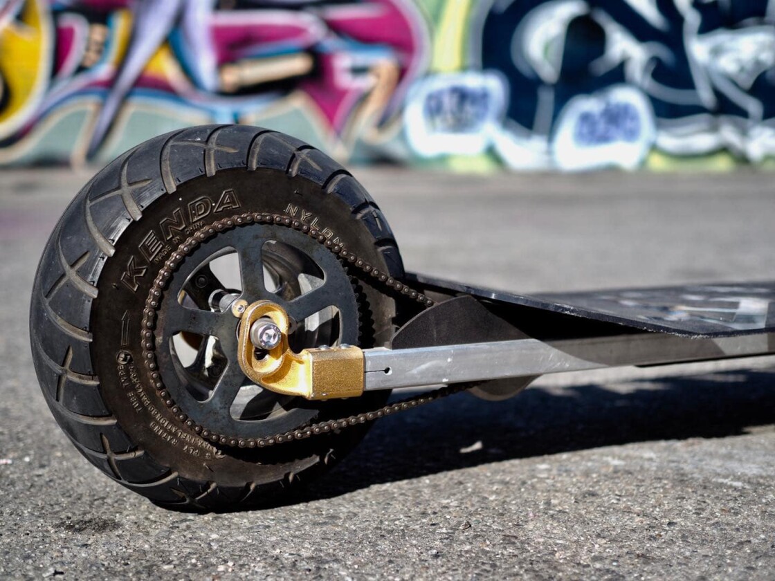 A close-up view of the Speedboard's chain drive