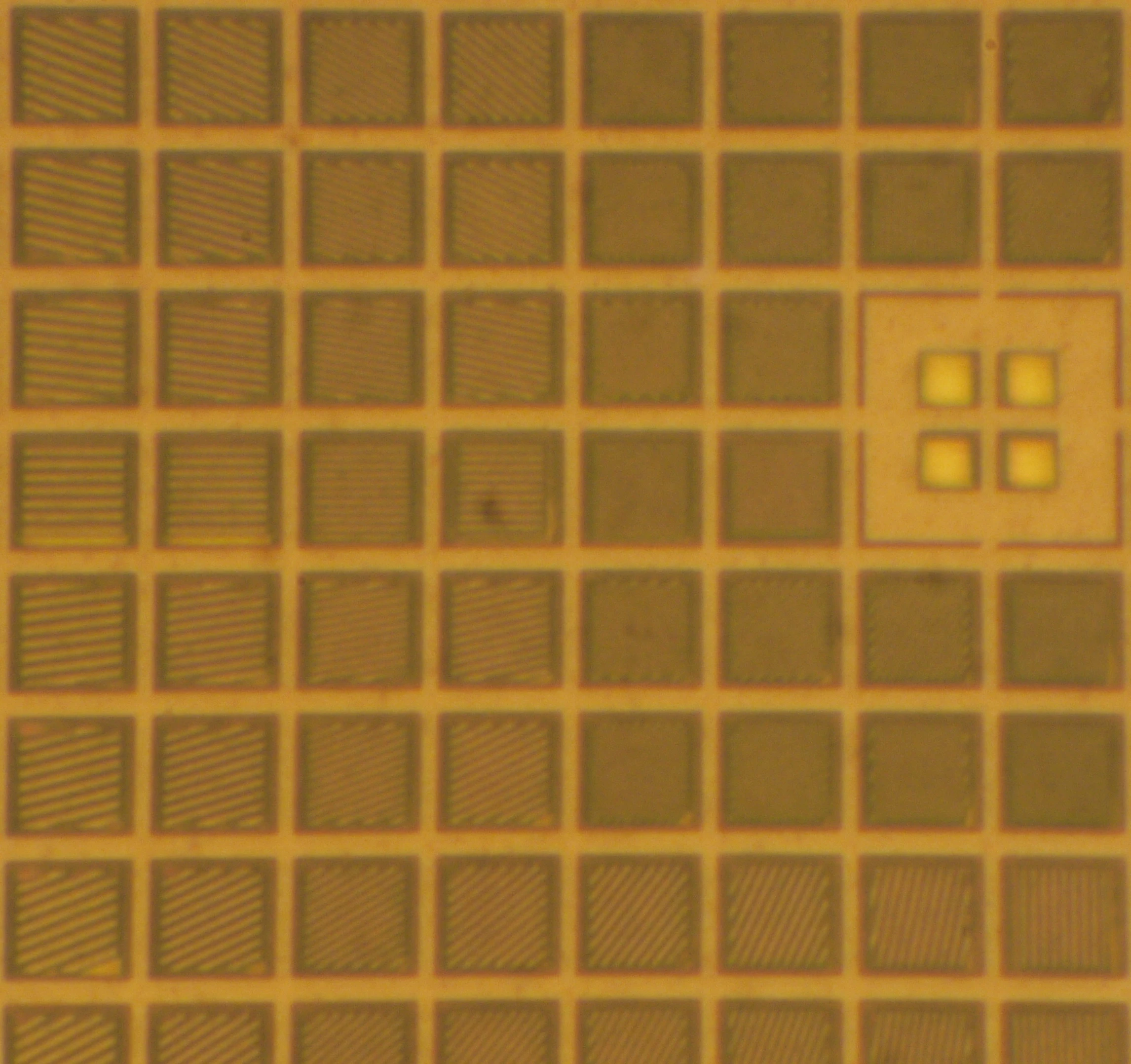 The left-center of a PFCA - note how each pixel has a unique set of optical gratings that radiate outwards from the middle (Photo: Patrick Gill)