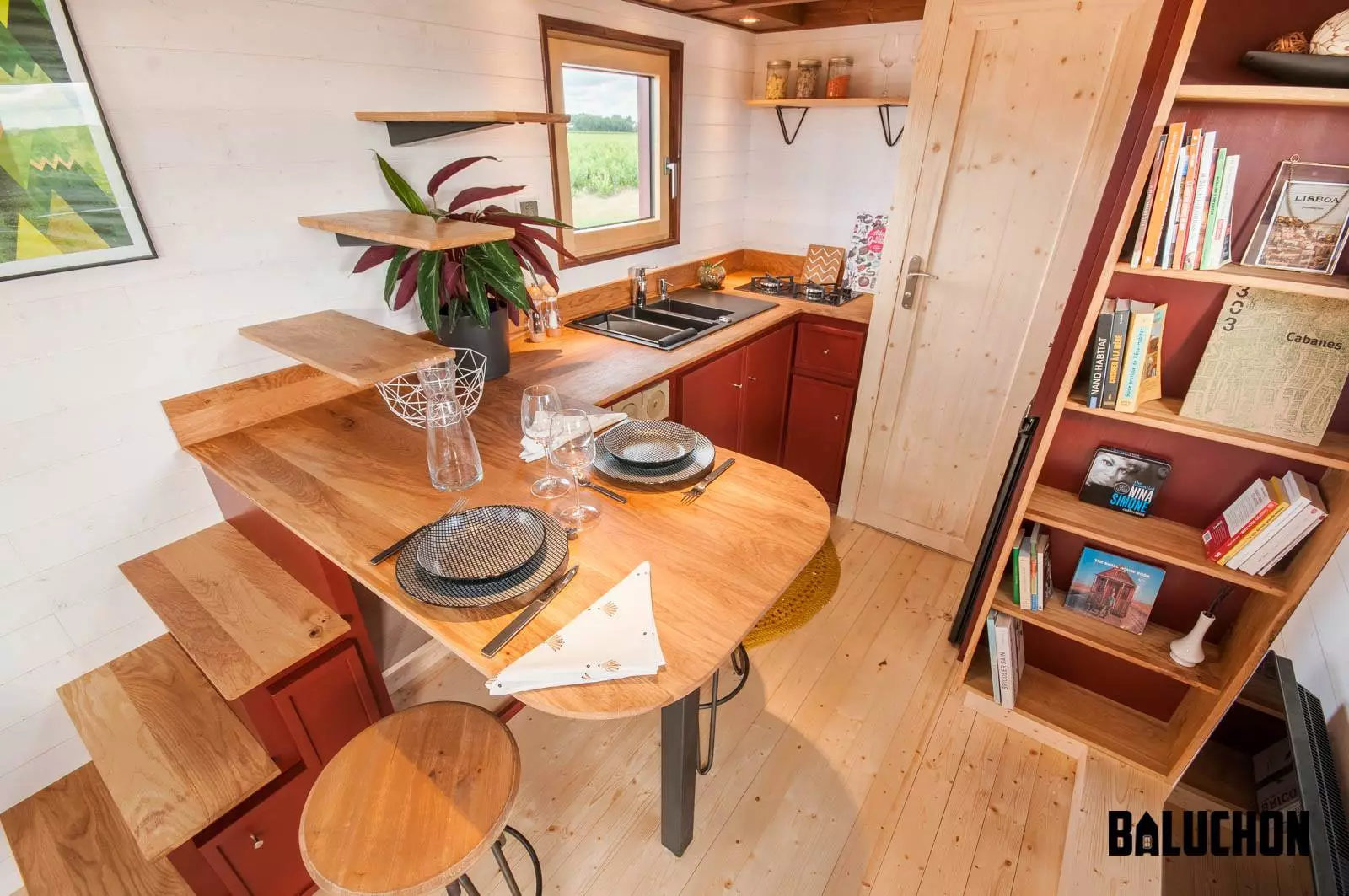 The Pampille's dining table is integrated into the staircase