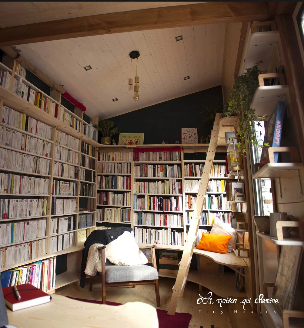 The tiny bookstore is La Maison Qui Chemine's first build