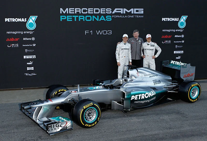 Michael Schumacher, Nico Rosberg, Ross Brawn and the 2012 Mercedes AMG Petronas F1 car