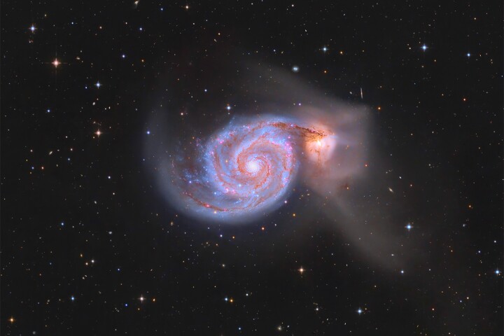 Young Astronomy Photographer of the Year Highly Commended: M51: The Whirlpool Galaxy © ZiYang Chang (China), aged 14. The Whirlpool Galaxy colliding with its neighbor NGC 5195