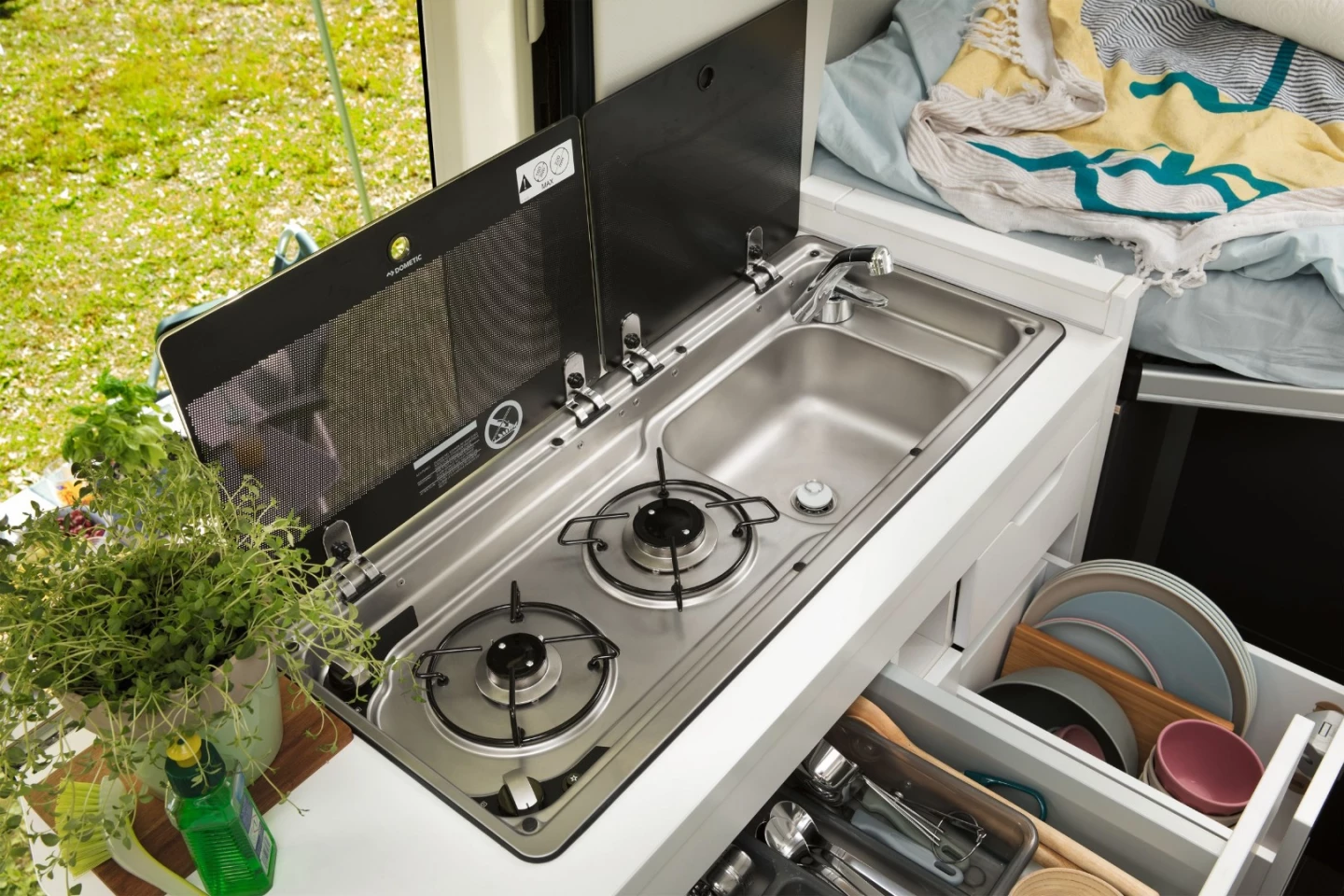 The Grand California's kitchen area is much more traditional than the XXL concept's, featuring the usual dual-burner/sink unit
