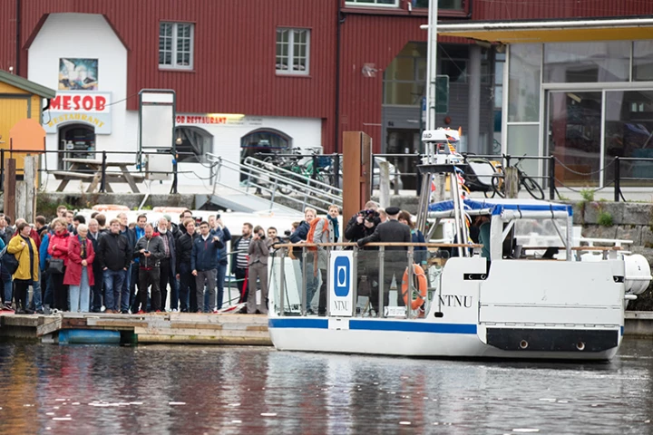 Passengers line up to try out the new milliAmpere 2