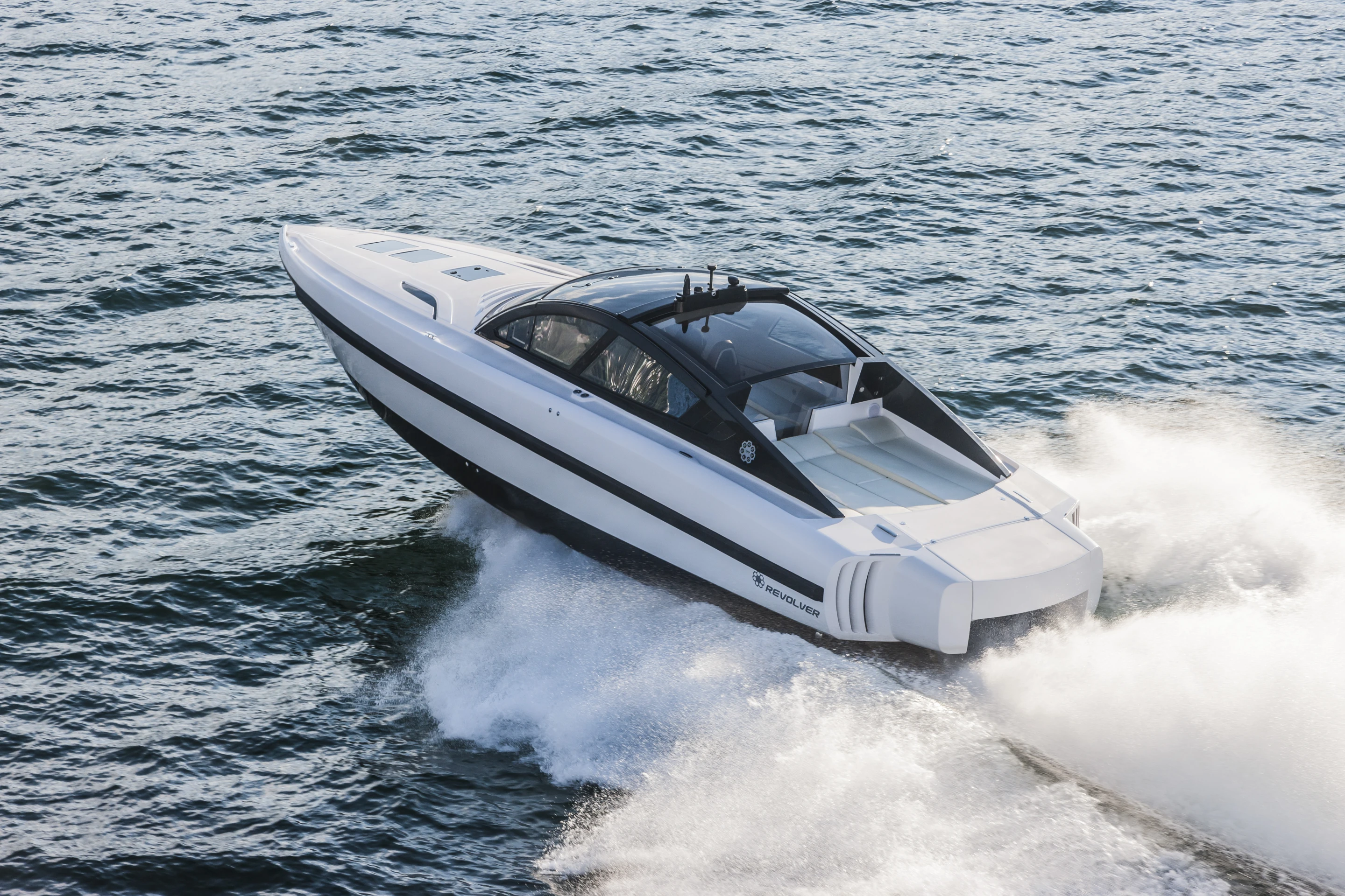 The 44GT has a retractable glass panel roof and window system that opens its cockpit