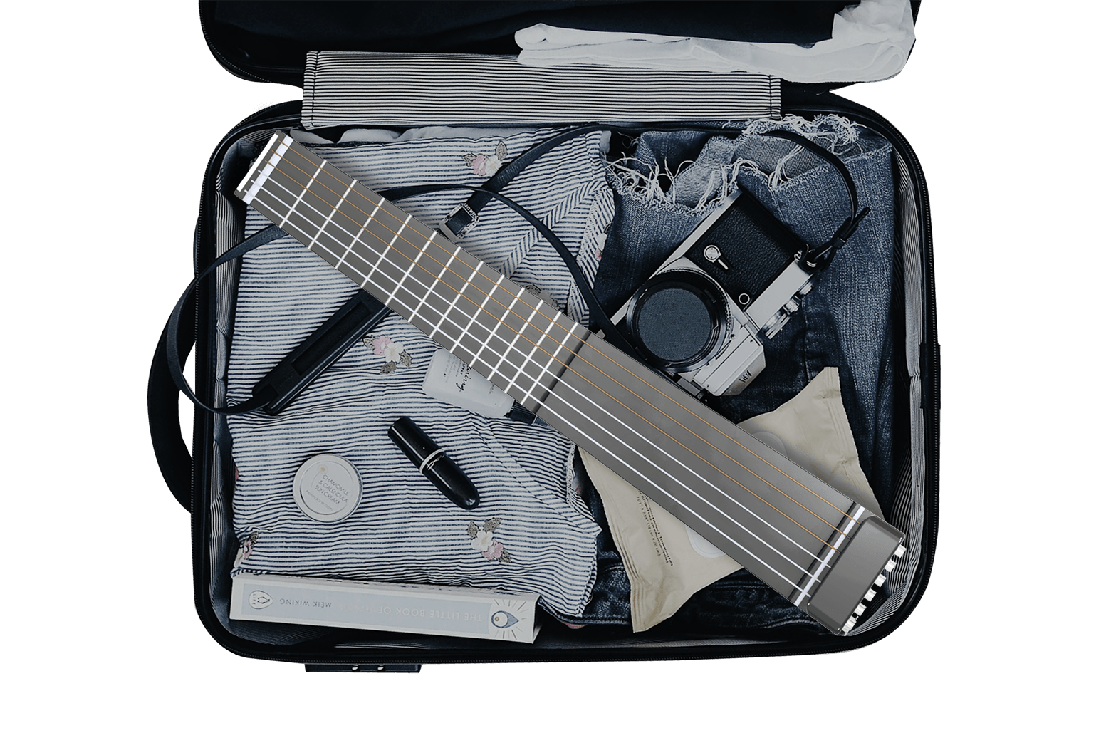 Suitcasefriendly travel guitar built to sound like acoustics twice its