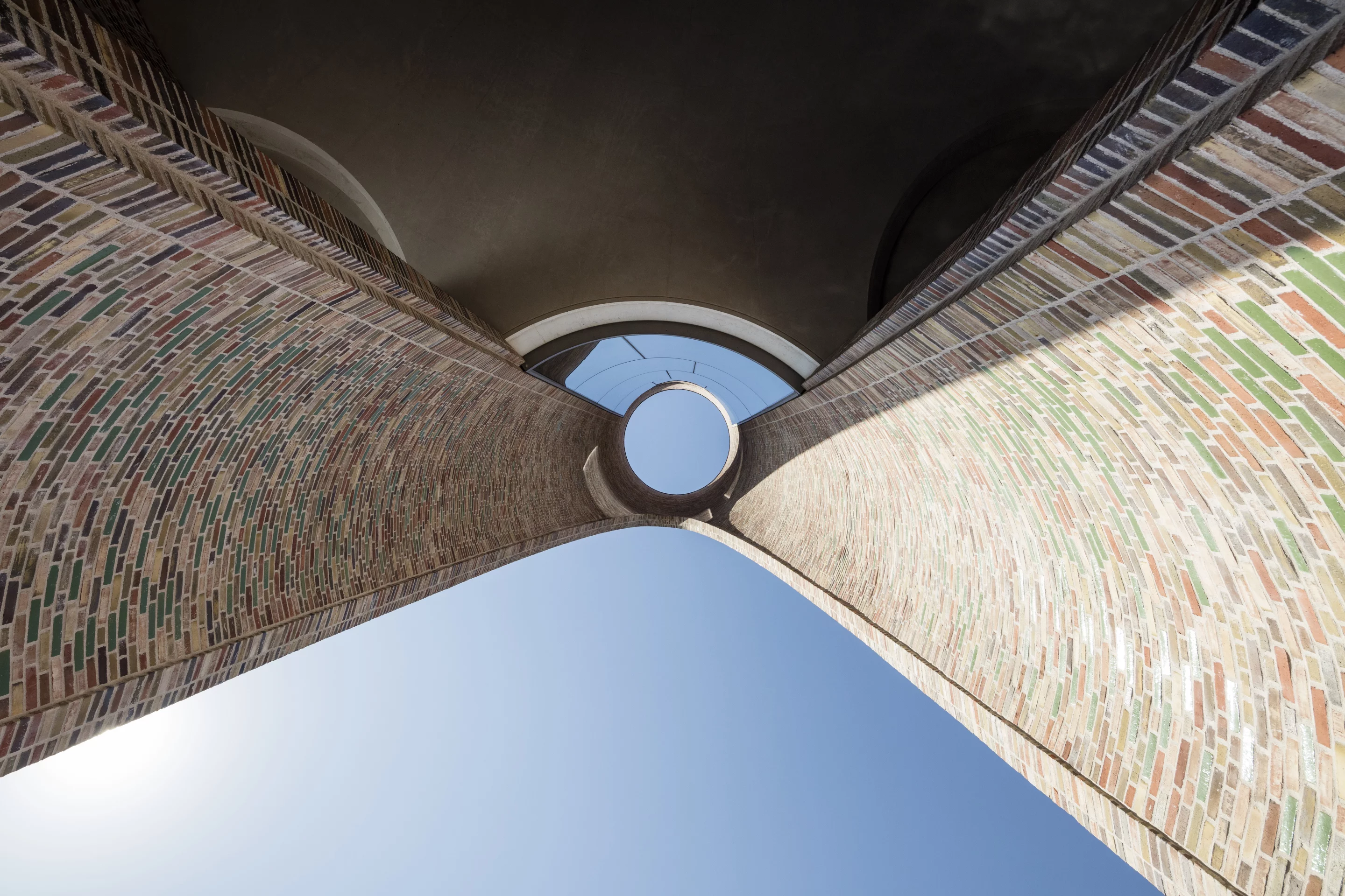 Fjordenhus is arranged into four converging cylinders