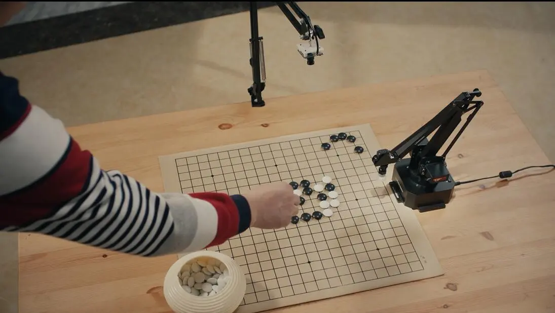 With the help of an OpenMV Cam, the uArm Swift Pro can be taught to play board games