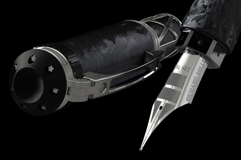 The Richard Mille RMS05 fountain pen uses a precision watch mechanism to extend the white-gold nib