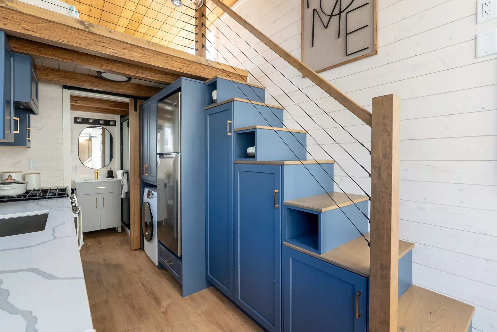 The Gambier's secondary bedroom is reached by storage-integrated staircase