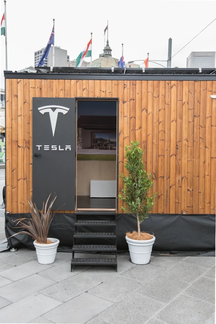 The tiny house will be towed by a Tesla Model X