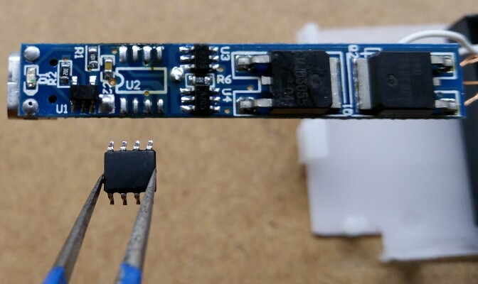 A pin-compatible PIC12F1840 microcontroller was mounted to the dual-arc lighter's PCB