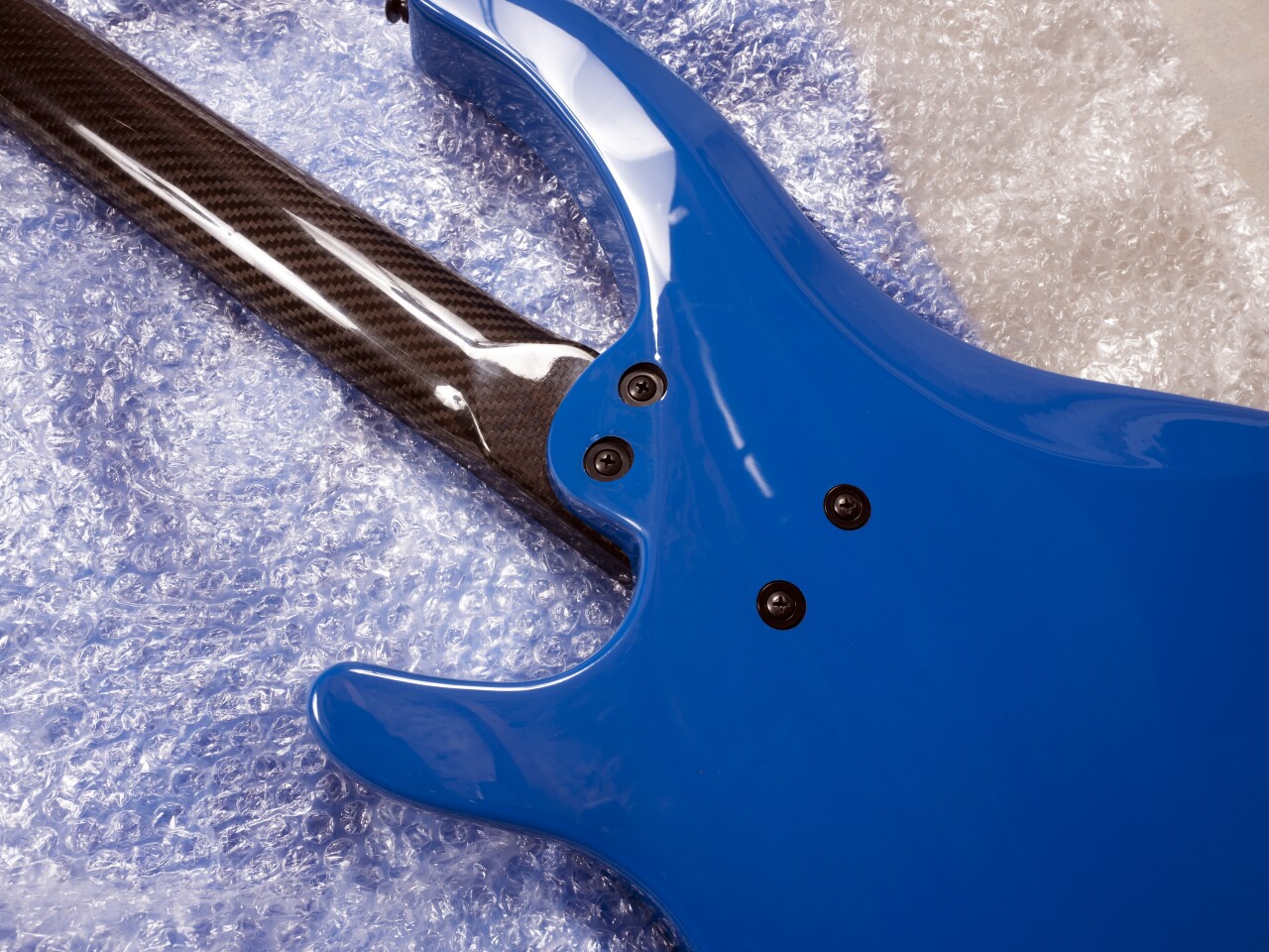 Travelfriendly electrics combine tonewood body and carbon fiber neck