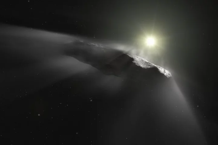 A new artist's impression of the interstellar object 'Oumuamua, which is now believed to be a very mildly-active comet