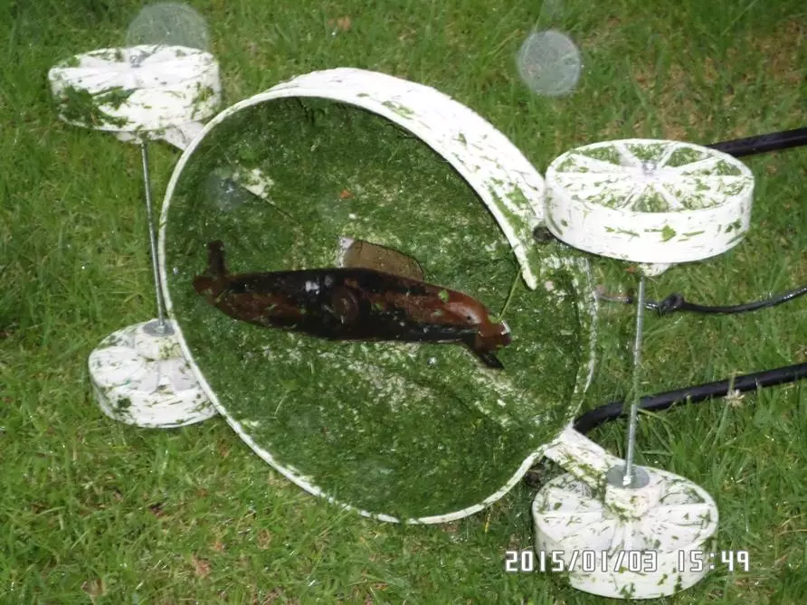 The blades, handle, switch and wheel shafts were transplanted from an old mower