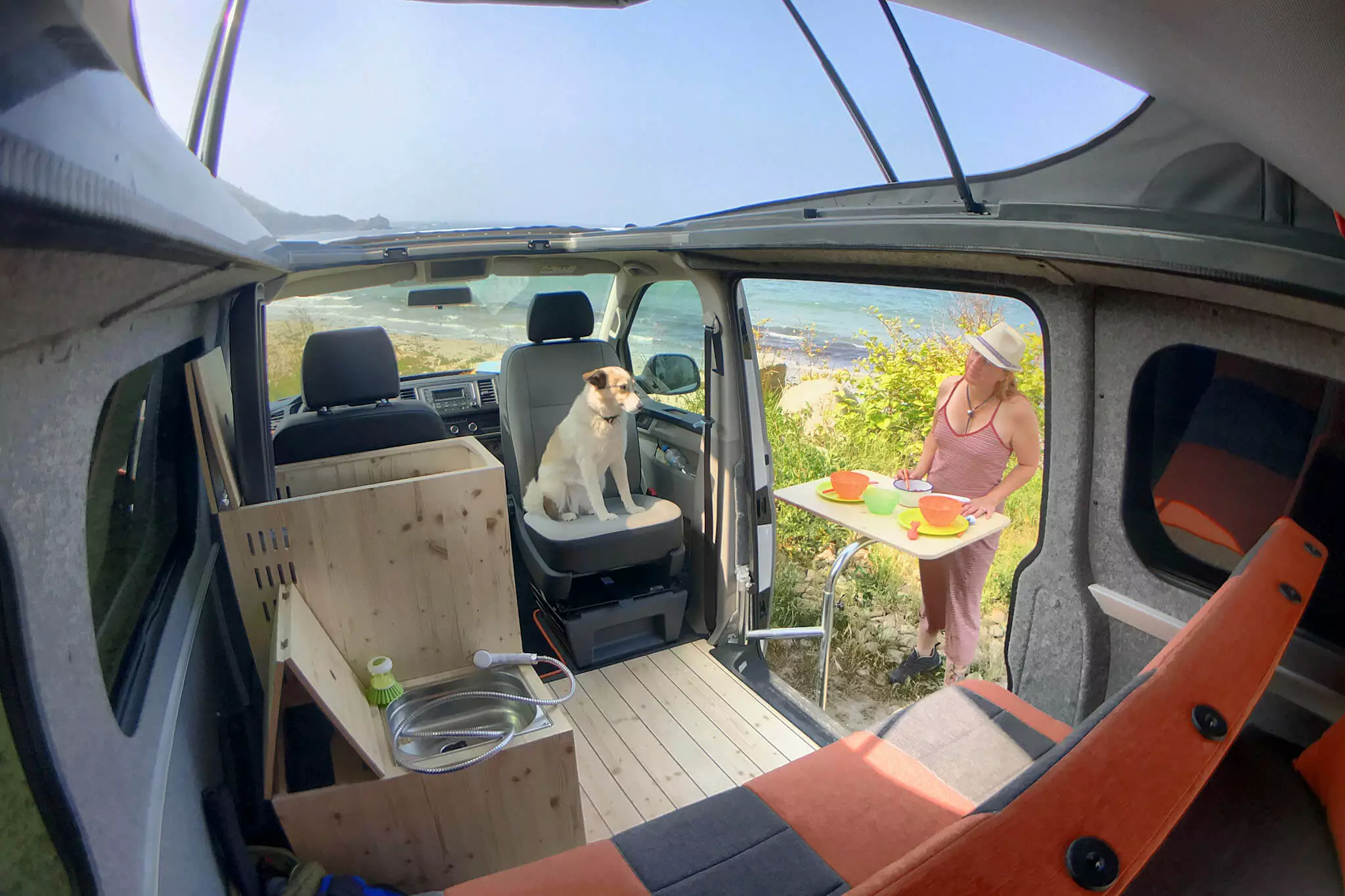 Versatile equipment like the swivel table, long sink sprayer/shower hose and portable single-burner stove help Volt lifers keep things free and flexible