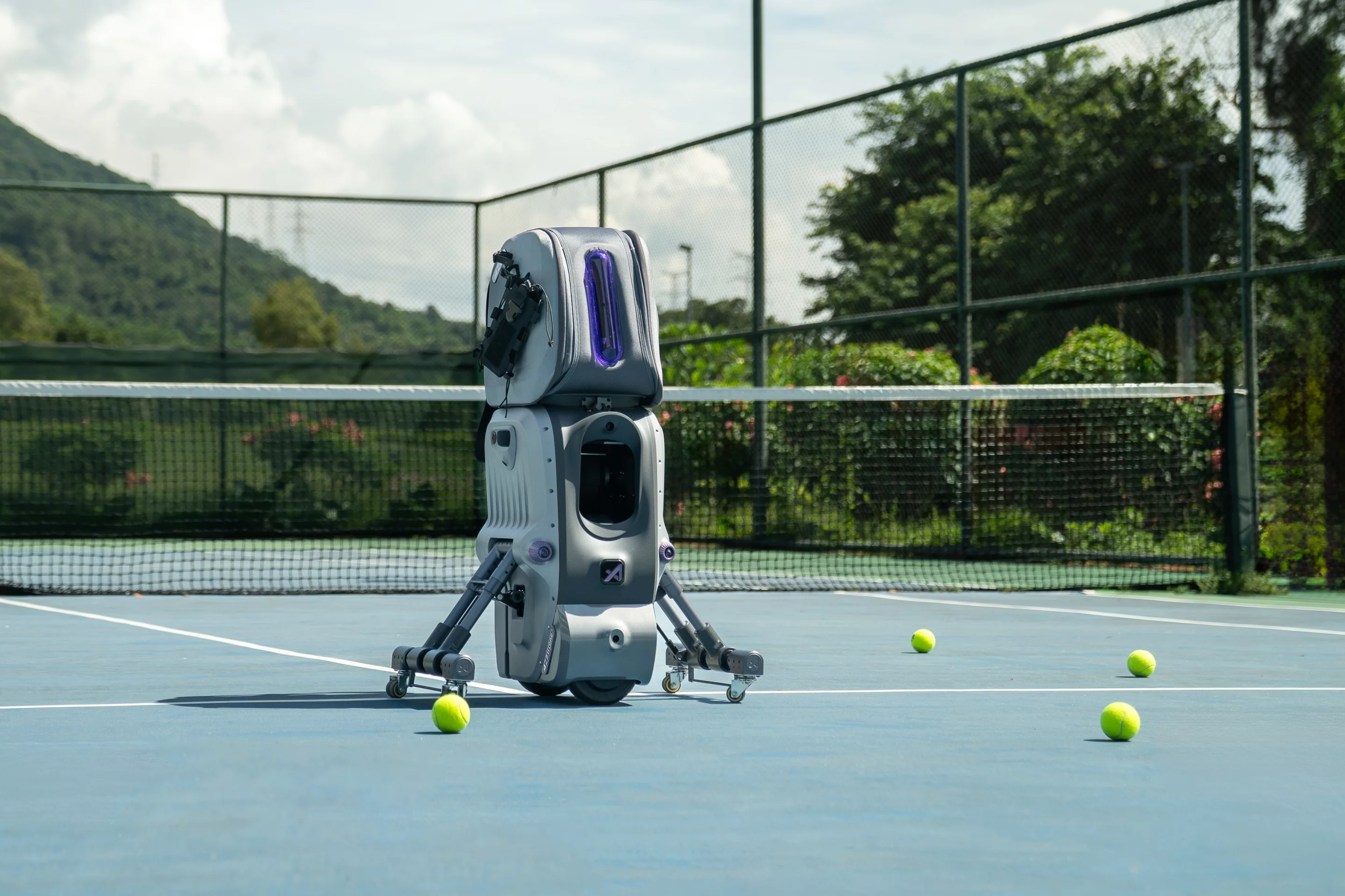 The robot with its ball bag attached measures 45.8 x 33.7 x 106.8 cm (18 x 13.3 x 42 in)