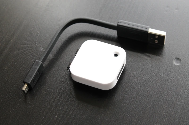 The device is provided with a USB cable for charging and uploading photos to the Narrative servers