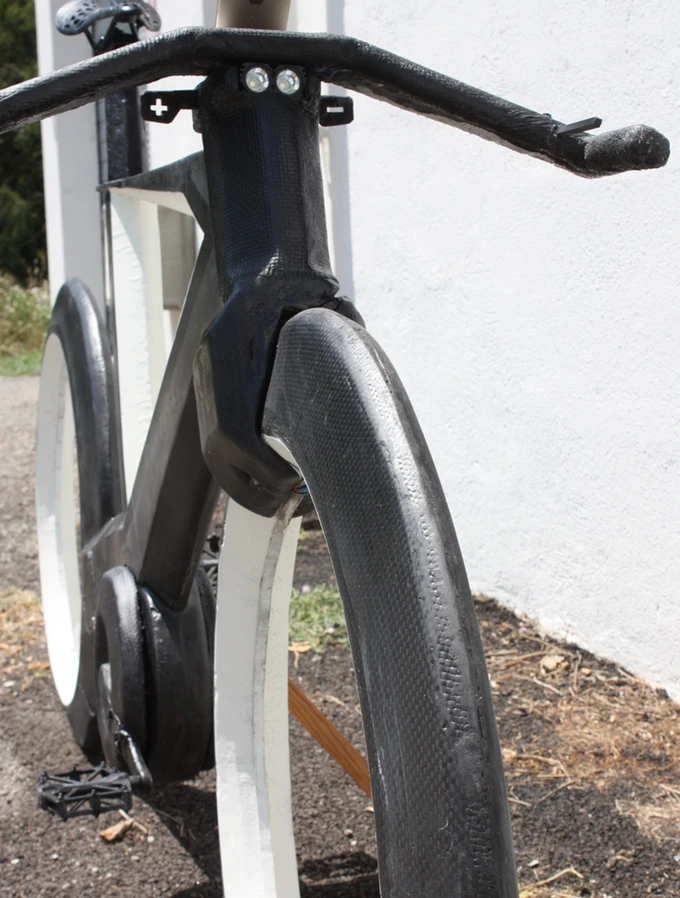 The wheels are enveloped in carbon fiber
