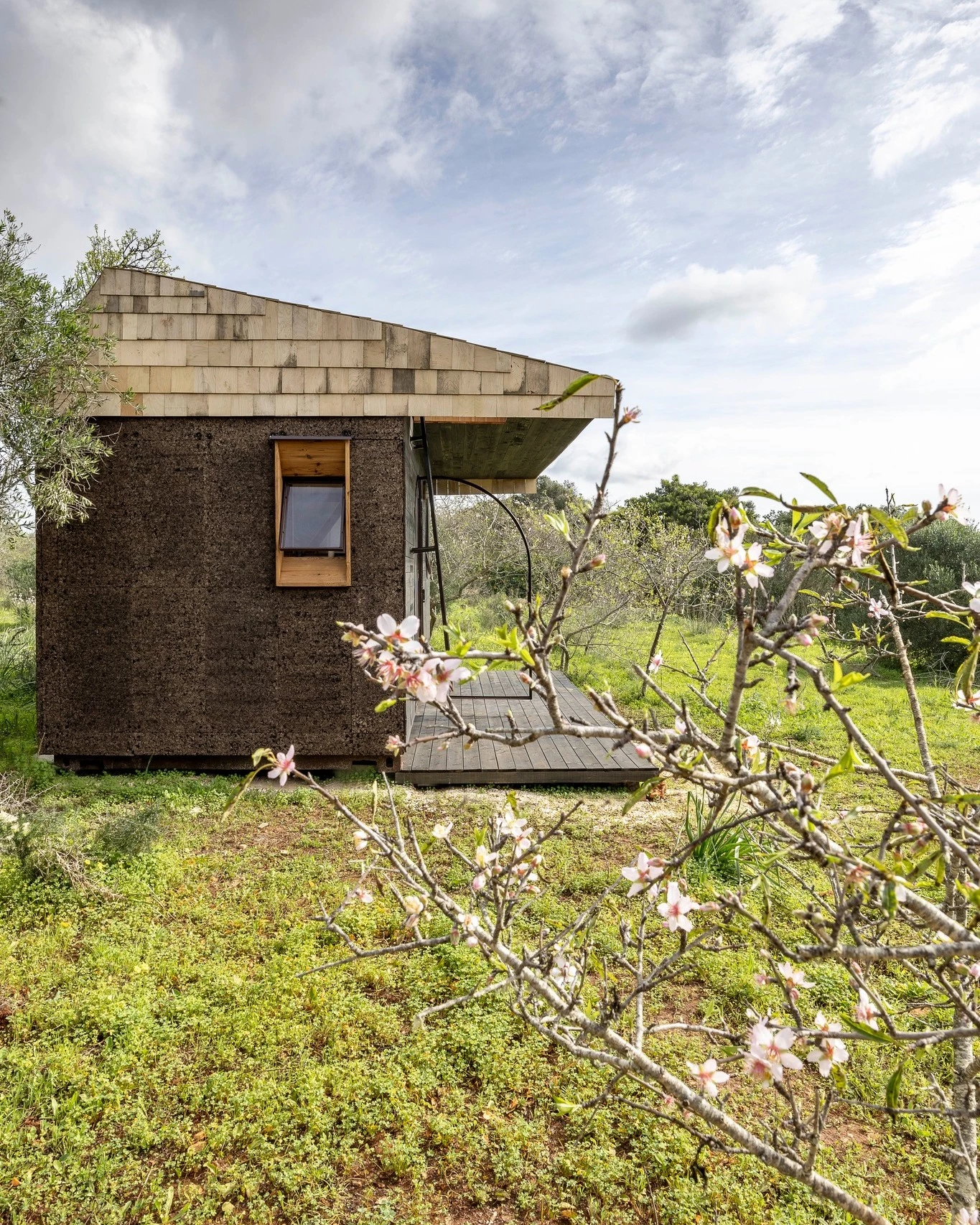 Cargo's shipping container exterior has been heavily modified and is finished in timber