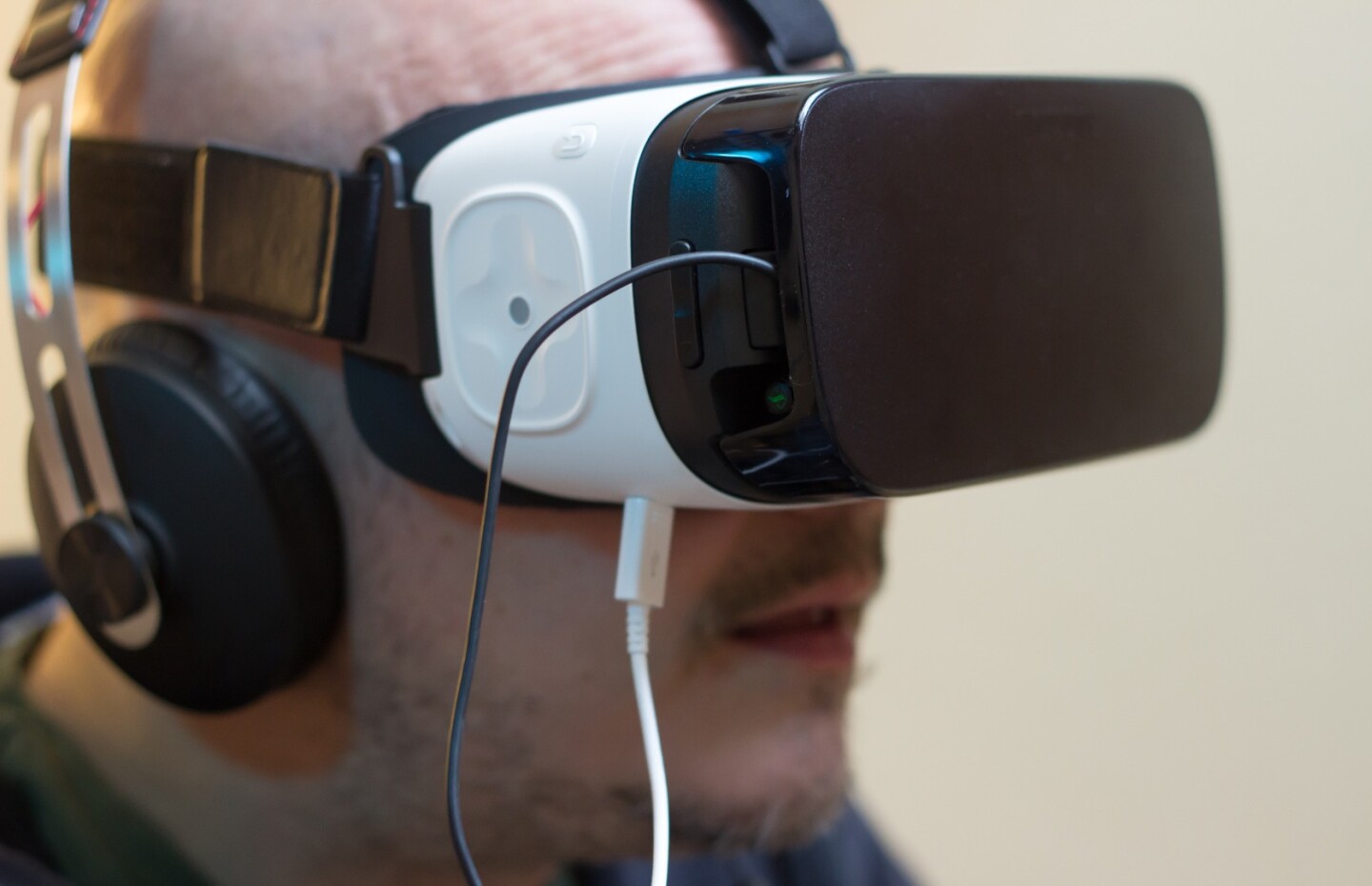 You can charge your headset while playing, with a couple caveats