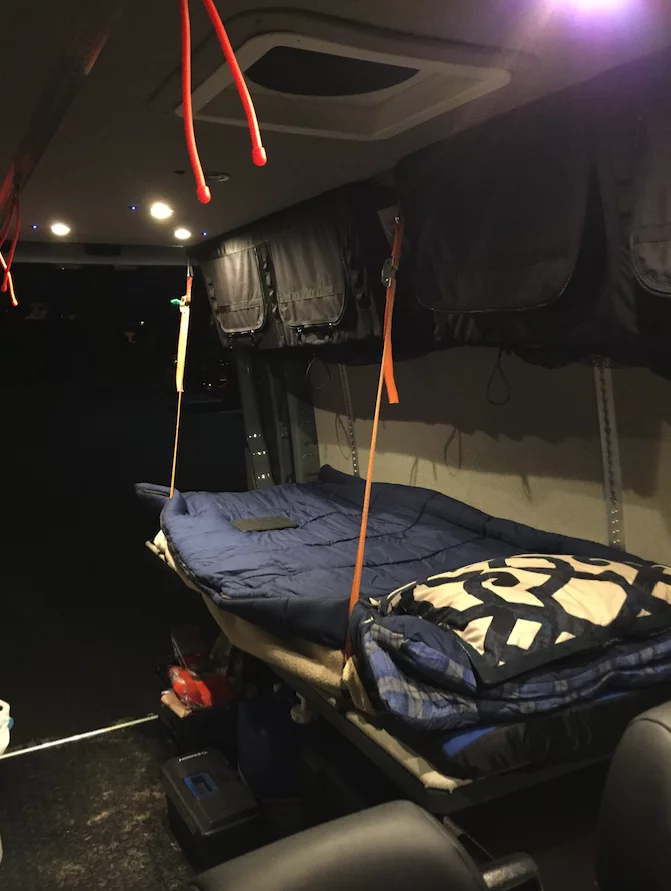 Adventure Wagon hasn't added the Munk Bunk option to its online materials just yet, but it's a drop-down single bed supported by a combination of the wall track and straps