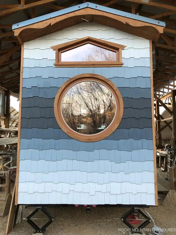 The rear of the San Juan Tiny House is finished in blue-shaded cedar shingles