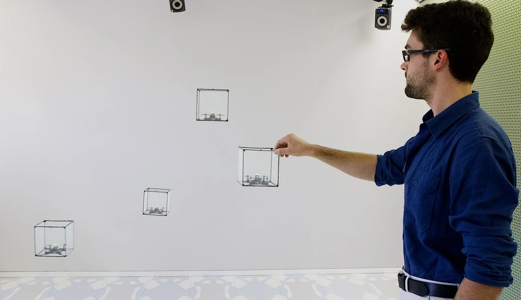 BitDrones track the user’s hand motions and touches to allow users to physically position the voxels in mid-air